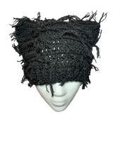 Gorro de punto con diseño de gato desgastado